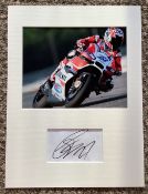 Casey Stoner 15x11 mounted Moto GP signature piece includes signed album page and a colour photo