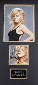 Kelly Clarkson 22x11 overall mounted signature display includes signed Breakaway CD sleeve and a