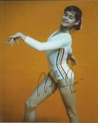Nadia Comaneci signed 10x8 inch colour photo. Nadia Elena Comaneci Conner, born November 12, 1961,