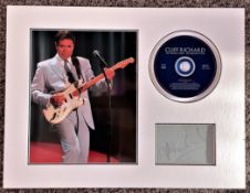 Cliff Richard 17x13 approx mounted signature piece includes signed album page superb colour photo