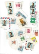 Hong Kong and Ireland stamps loose on backing paper. Good condition. We combine postage on