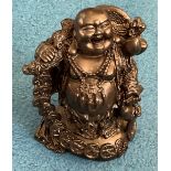 Black buddha carving. Approx 15cm in height. Good condition. We combine postage on multiple