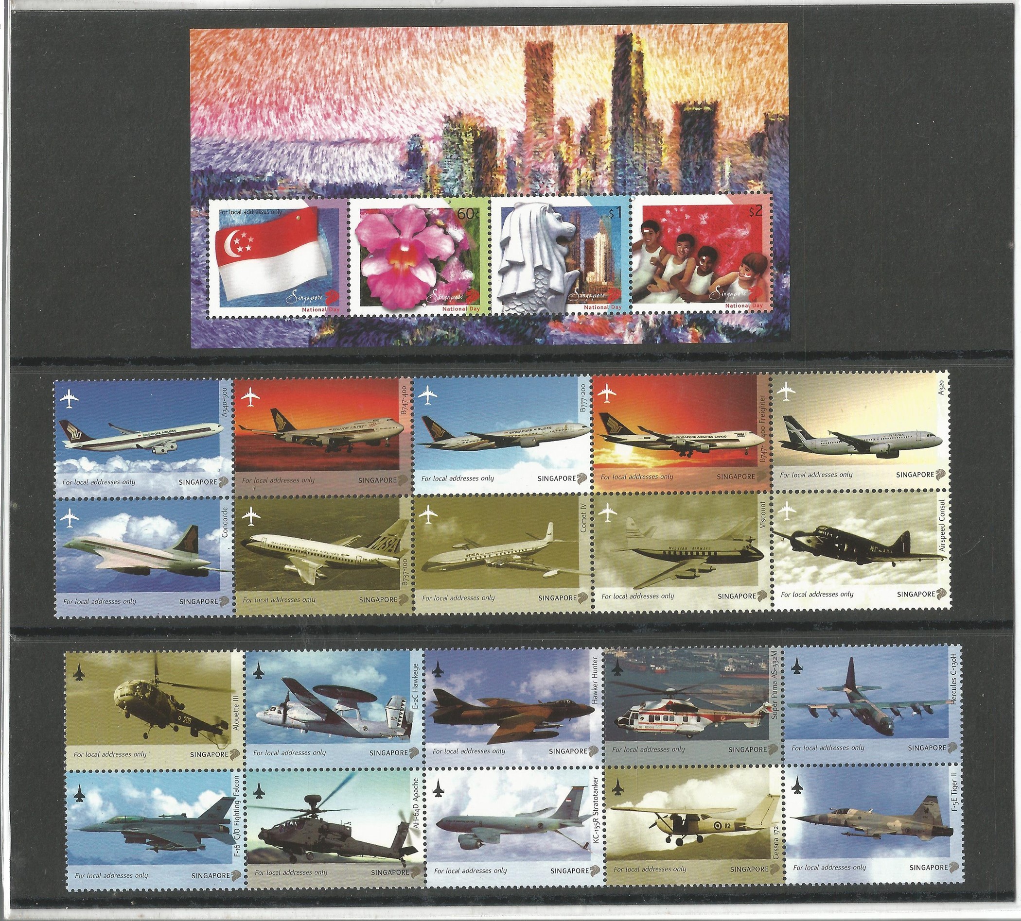 Singapore 2003 presentation book of stamps in slipcase. Unmounted mint stamps. Good condition. We