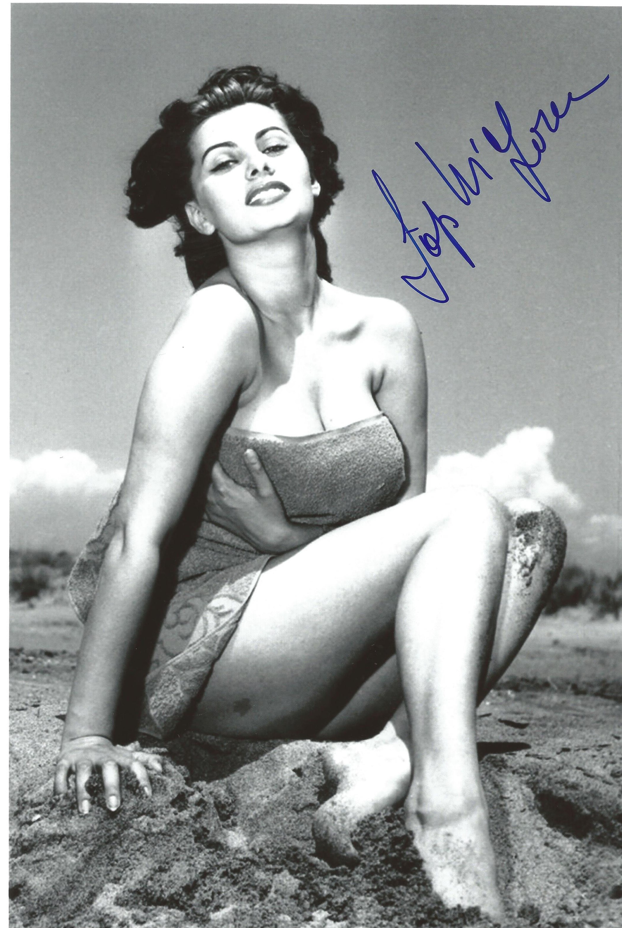 Sophia Loren, signed 12x8 black and white photograph Loren is an Italian actress who was named by
