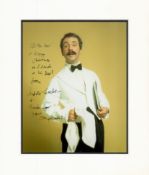 Andrew Sachs signed colour Manuel from Fawlty Towers photo. Approx size 12x12.Good condition. All