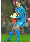 Tom Heaton signed 12x8 colour photo of the goalkeeper.Good condition. All autographs come with a