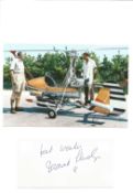 Desmond Llewelyn signature piece below colour photo.Good condition. All autographs come with a