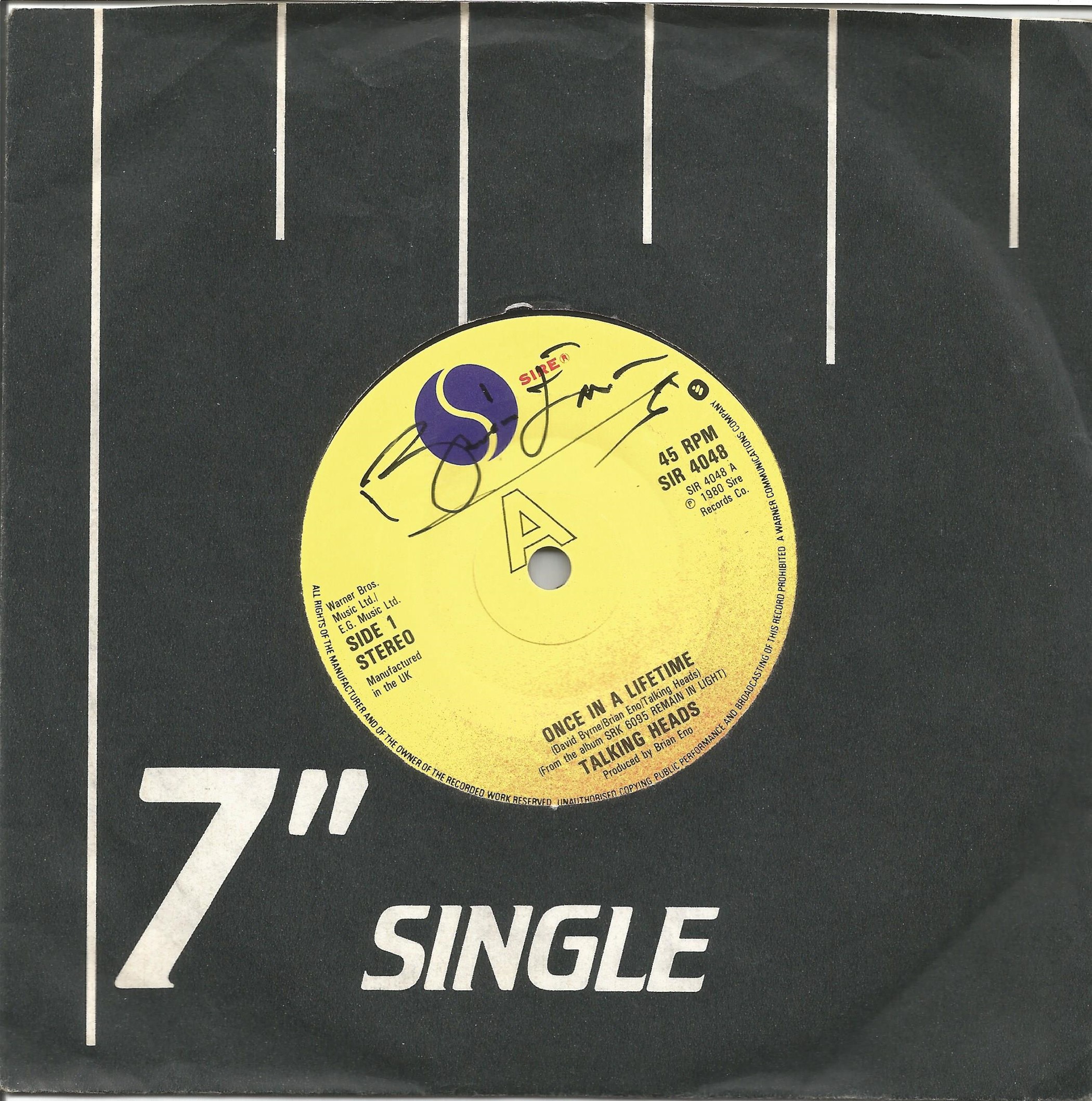 Brian Eno of Talking Heads signed 45rpm record.Good condition. All autographs come with a