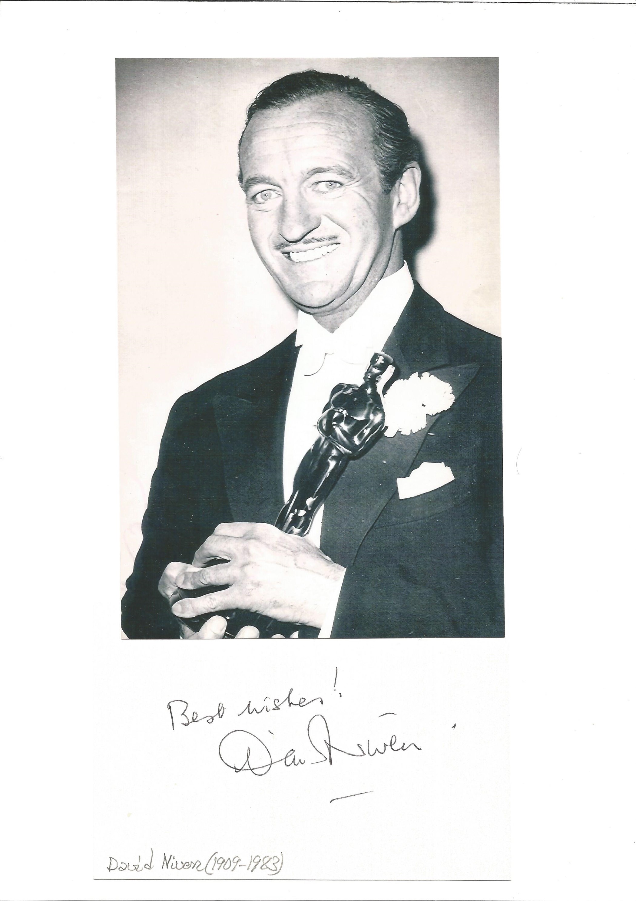 David Niven signature piece below black and white photo.Good condition. All autographs come with a