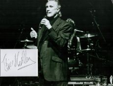 Bill Medley signed and matted black and white presentation photograph. This 12x8 signature piece