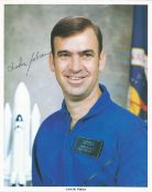NASA astronaut John Fabian signed 10 x 8 inch colour photo.Good condition. All autographs come