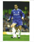 Signed 8x10 photo of the football legend Gus Poyet during his time at Chelsea, where he won the