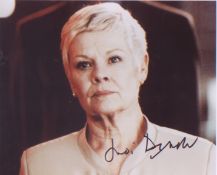 Judi Dench signed 10 x 8 inch photo in character from Bond.Good condition. All autographs come