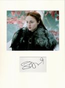 Sophie Turner signature piece mounted below colour Game of Thrones photo. Approx size 16x12.Good