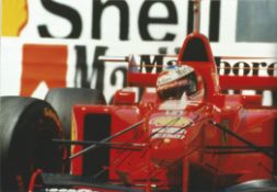 Michael Schumacher signed 12x8 colour photo.Good condition. All autographs come with a Certificate