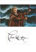 Charlton Heston signature piece below colour photo.Good condition. All autographs come with a