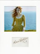 Eleanor Tomlinson signature piece mounted below colour Poldark photo. Approx size 16x12.Good