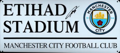 Nathan Ake signed replica Etihad Stadium metal sign. Approx 15x6.Good condition. All autographs come