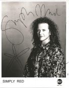 Mick Hucknall signed 10x8 black and white photo. Slight foxing to edge of photo. English singer