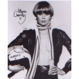 New Avengers Joanna Lumley signed 10x8 picture in character from the classic 1970s show.Good
