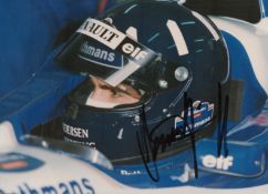 F1 Legend Damon Hill Hand signed 6x4 Colour Photo. Photo shows Hill in his Race Car wearing uniform.