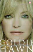Goldie Hawn Hand signed Book Titled 'A Lotus Grows In The Mud'. First Edition Hardback book.