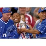 Autographed ROD WALLACE 12 x 8 photo - Col, depicting Rangers Albertz, Wallace and Van Bronckhorst