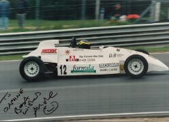 Andre D'Cruze Hand signed 12x8 Colour Photo. Photo shows Andre D'Cruze in his Formula 1 Car.