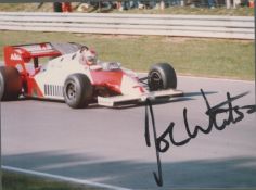 F1 Racer John Watson Hand signed 5x4 Colour Photo of his Race car on the track. Fantastic signature,