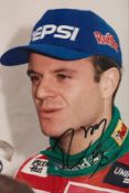 Rubens Barrichello Hand signed 6x4 Colour Photo of himself wearing racing uniform. Great