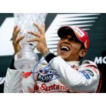 Lewis Hamilton signed 12x8 colour photo. British racing driver. He currently competes in Formula One