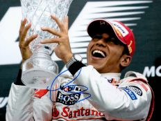 Lewis Hamilton signed 12x8 colour photo. British racing driver. He currently competes in Formula One