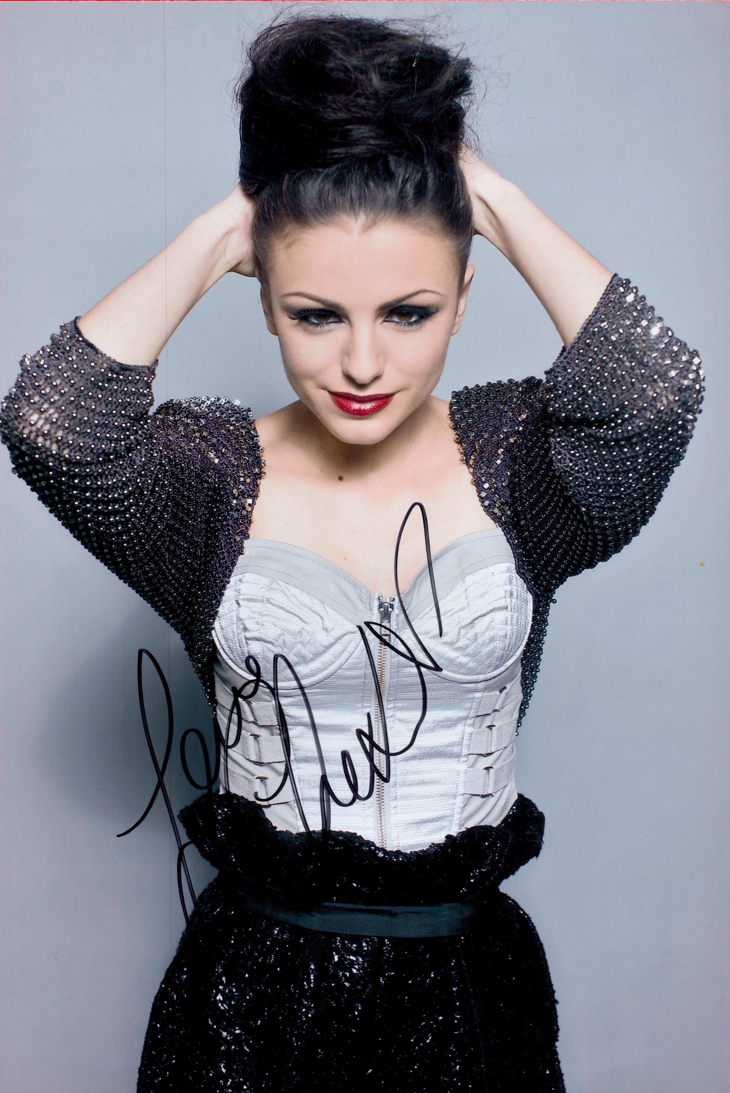 Cher Lloyd signed 12x8 colour photo. Cher Lloyd (born 28 July 1993) is an English singer. She