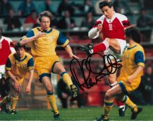 Arsenal FC Alan Smith Hand signed 10x8 Colour Photo. Photo shows Smith taking a shot against an