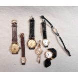 4 lady's 9ct gold wristwatches, a lady's cocktail watch, a gentleman's gold plated watch by Leda and