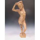 A modern painted plaster figure of a standing female nude, 63cm high