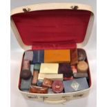 A small suitcase and two boxes containing a large collection of vintage and modern jewellery and