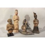 A group of four Chinese painted pottery figures and half figures, perhaps Han Dynasty and later,