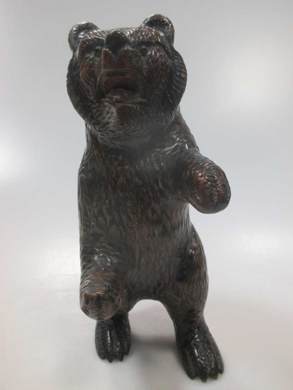 A carved walnut 'musical' bowl, probably Black Forest, and a carved model bear - Image 2 of 9