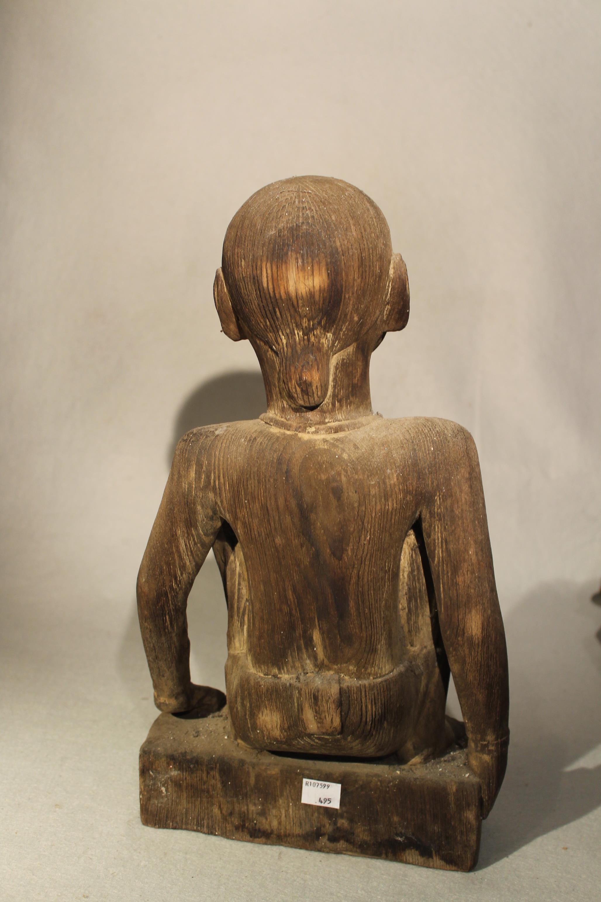 A Naga carved wood squatting figure, and a Cameroon standing figure, both mid 20th century, both - Image 2 of 3