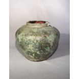 A Chinese green glazed pottery, shouldered vase, probably Han Dynasty, 19cm high