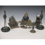 A pair of brass andirons, assorted classical style table lamps, a bronzed vase, a copper desk stand,