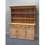 A Victorian and later pine dresser, with turned knob handles to frieze drawers 198 x 168 x 46cm