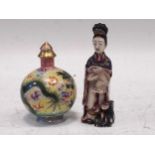 A Chinese carved and painted ivory snuff bottle, circa 1920, as a maiden holding a hare, ligzhi at