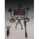 A collection of vintage utensils, including 3 ladles, trivet, sugar cutters, brass apostle style
