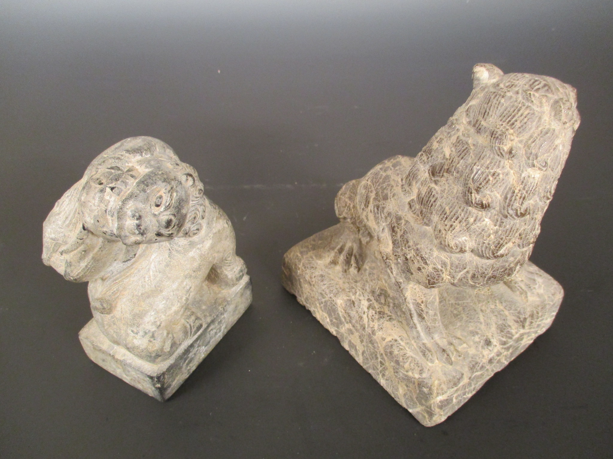A Chinese greystone carving of two fighting Fo-Dogs, in archaic style,12cm high: and a veined - Image 2 of 2