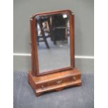 An 18th century walnut dressing table mirror, 55cms high