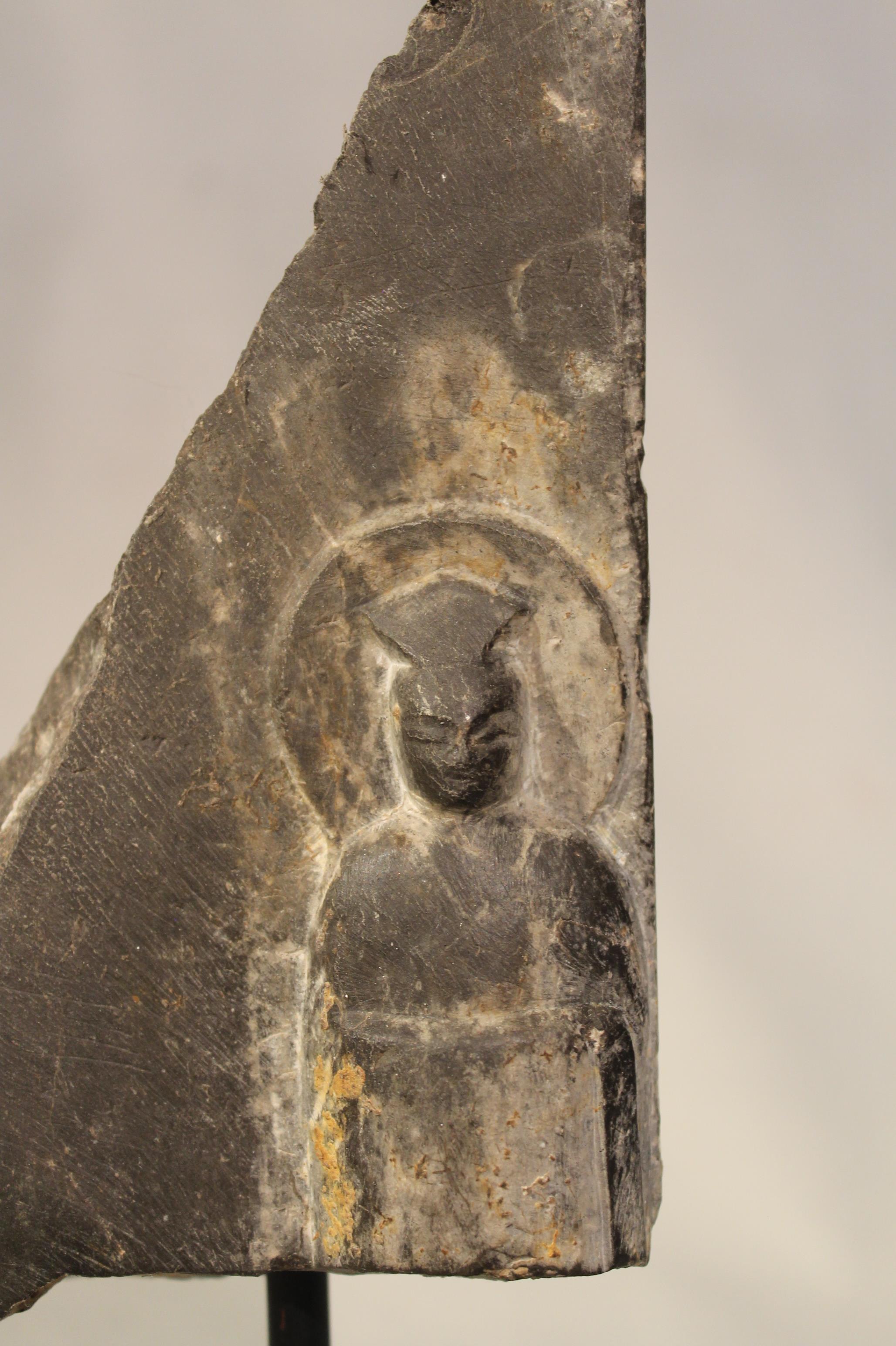 A Chinese black stone stele fragment carved with a Buddhist disciple, in Wei Dynasty style, 17.5cm - Image 3 of 3