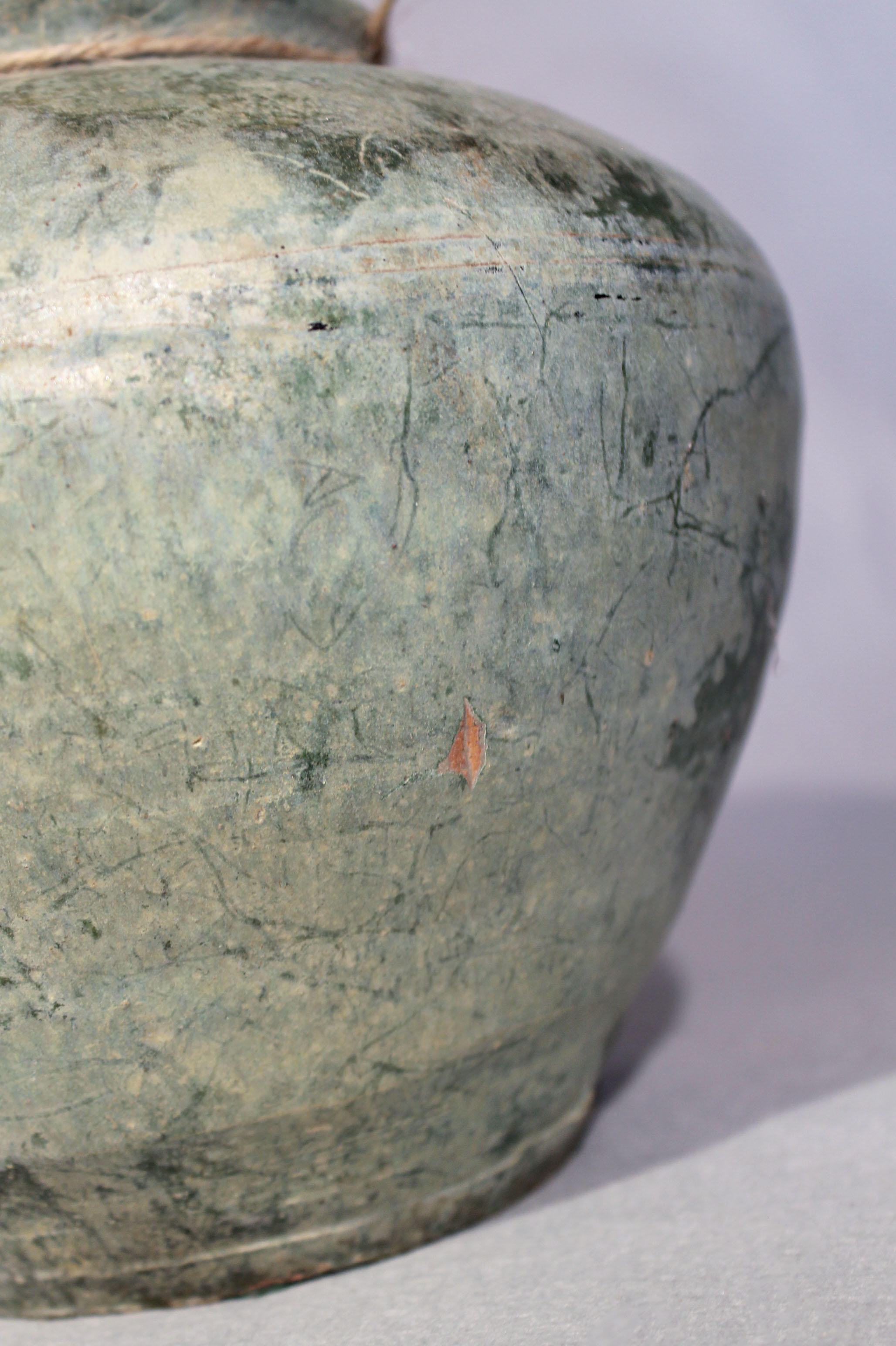 A Chinese green glazed pottery, shouldered vase, probably Han Dynasty, 19cm high - Image 3 of 4