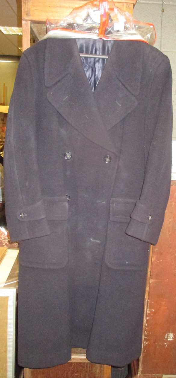 A mid 20th century military great coat, a ladies fur coat, various linen and textiles etc